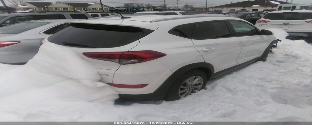 KM8J3CA42HU585341 2017 HYUNDAI TUCSON photo no. 4