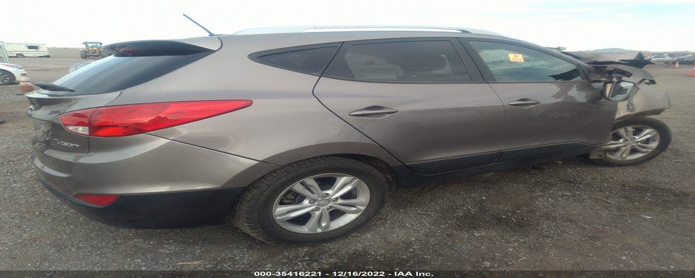 KM8JU3AC9CU483256 2012 HYUNDAI TUCSON photo no. 4