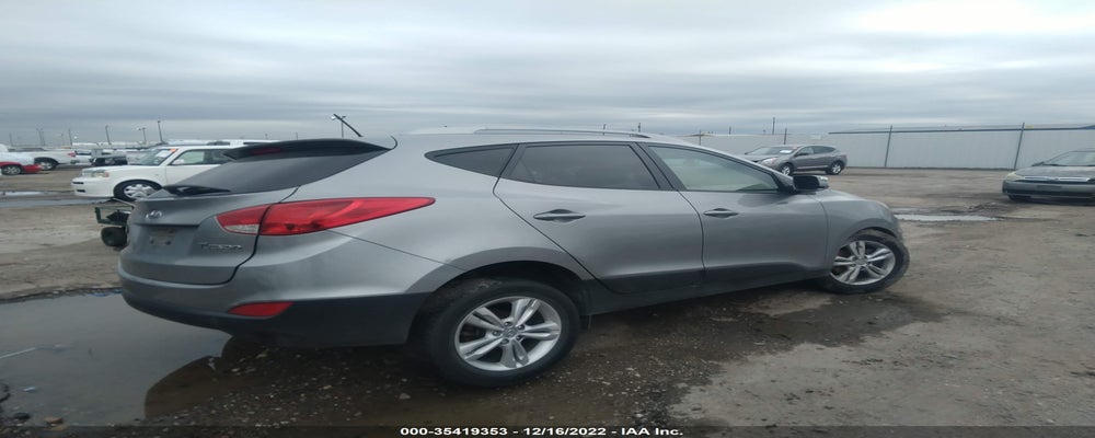 KM8JU3AC5DU749079 2013 HYUNDAI TUCSON photo no. 4