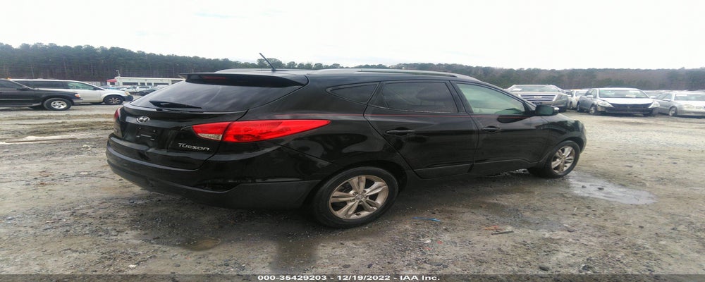 KM8JU3AC0DU568875 2013 HYUNDAI TUCSON photo no. 4