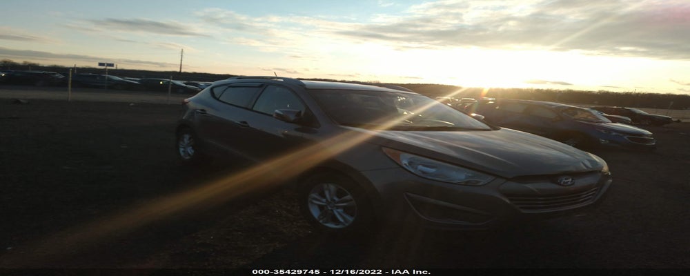 KM8JUCAC2CU491795 2012 HYUNDAI TUCSON photo no. 7