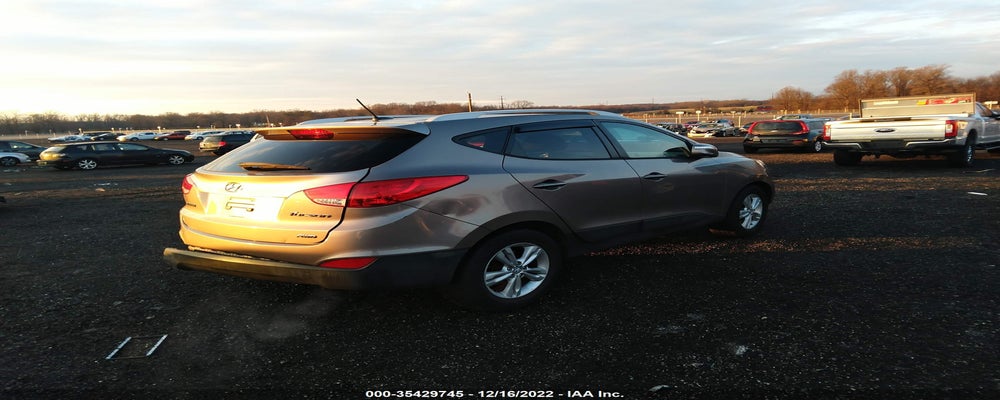 KM8JUCAC2CU491795 2012 HYUNDAI TUCSON photo no. 4