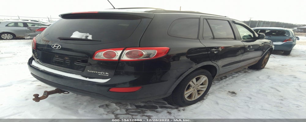 5XYZHDAG6BG091677 2011 HYUNDAI SANTA FE photo no. 4