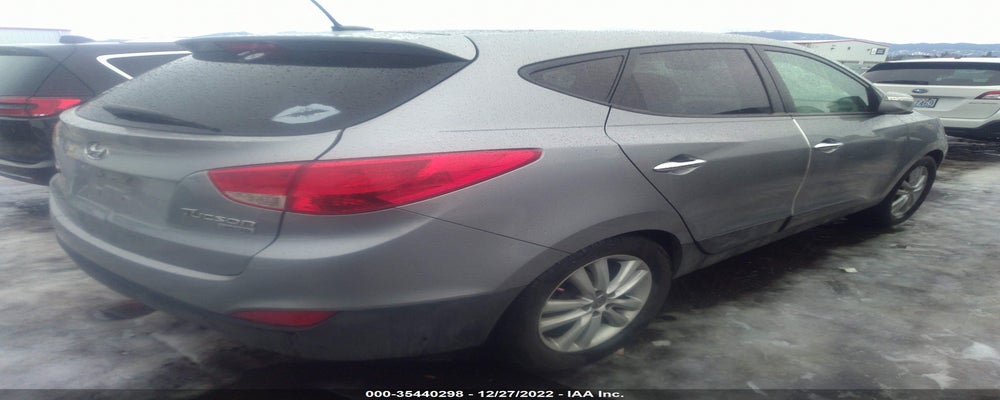 KM8JU3AC9CU498002 2012 HYUNDAI TUCSON photo no. 4