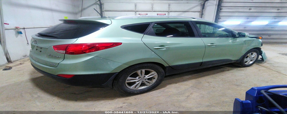 KM8JUCAC6DU677518 2013 HYUNDAI TUCSON photo no. 4