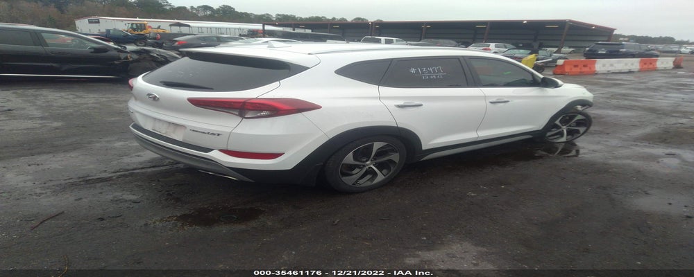 KM8J33A29HU386592 2017 HYUNDAI TUCSON photo no. 4