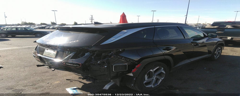 KM8JFDA20NU033702 2022 HYUNDAI TUCSON PLUG-IN HYBRID photo no. 4