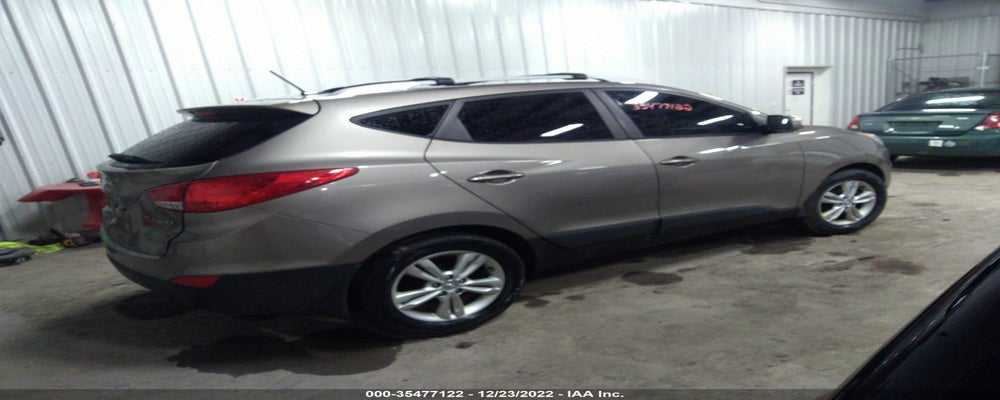 KM8JU3AC6DU659570 2013 HYUNDAI TUCSON photo no. 4