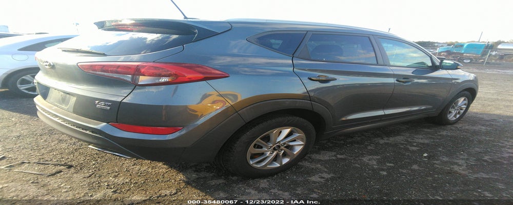 KM8J3CA25GU083730 2016 HYUNDAI TUCSON photo no. 4