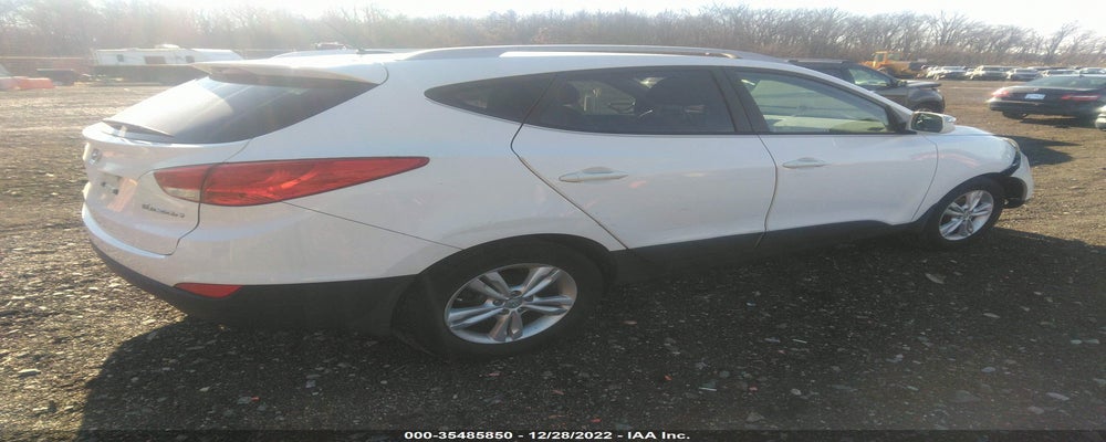 KM8JU3AC8DU662163 2013 HYUNDAI TUCSON photo no. 4