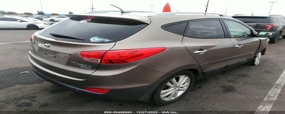 KM8JU3AC6DU659519 2013 HYUNDAI TUCSON photo no. 4