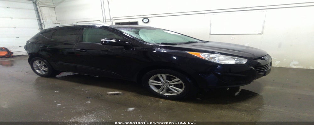 KM8JUCAC0CU529475 2012 HYUNDAI TUCSON photo no. 4