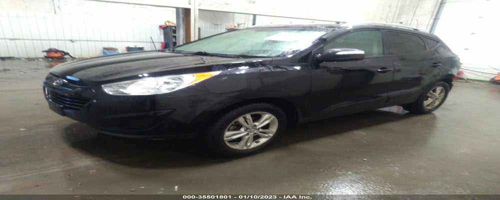KM8JUCAC0CU529475 2012 HYUNDAI TUCSON photo no. 2