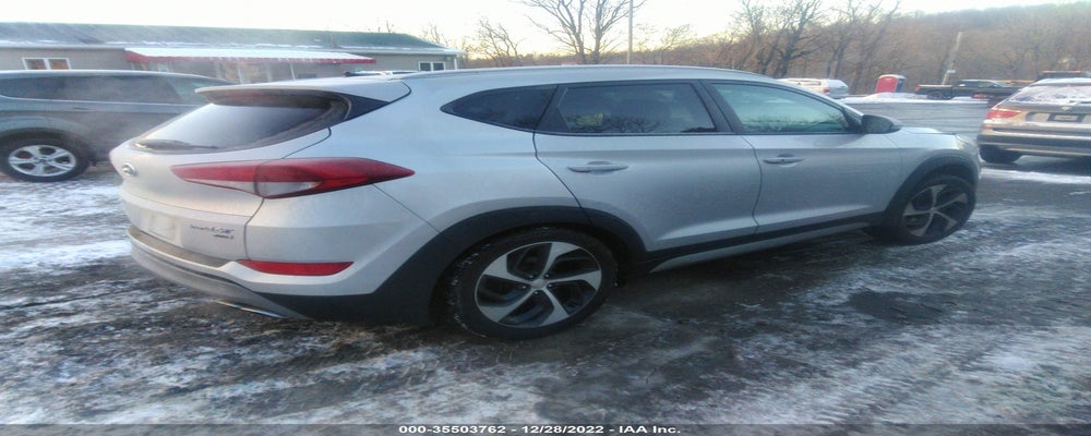 KM8J3CA20HU301400 2017 HYUNDAI TUCSON photo no. 4