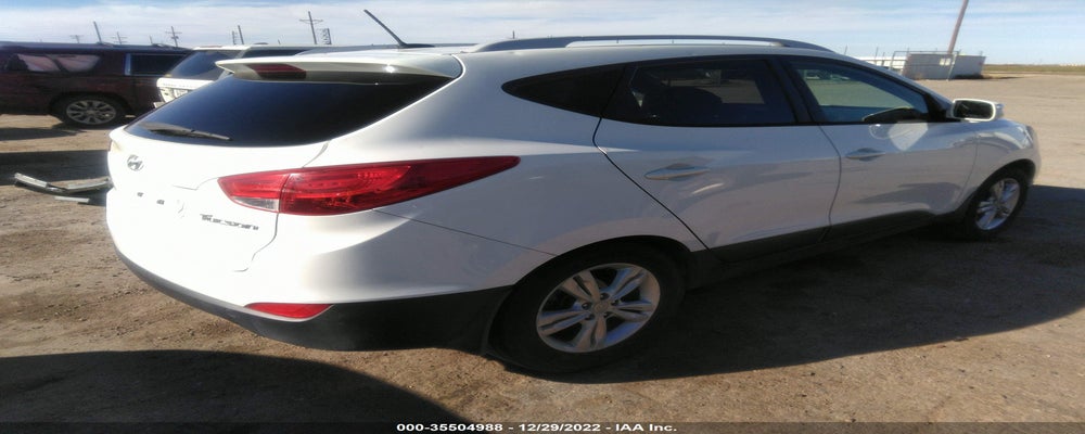 KM8JU3AC1CU518694 2012 HYUNDAI TUCSON photo no. 4
