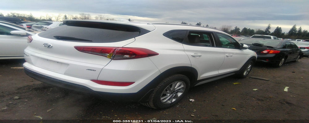 KM8J3CA41JU774939 2018 HYUNDAI TUCSON photo no. 4