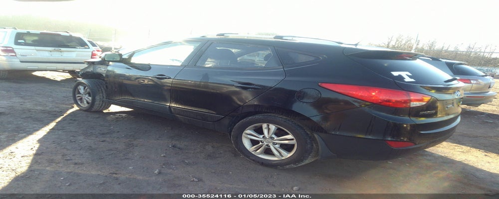 KM8JU3AC1CU433824 2012 HYUNDAI TUCSON photo no. 3