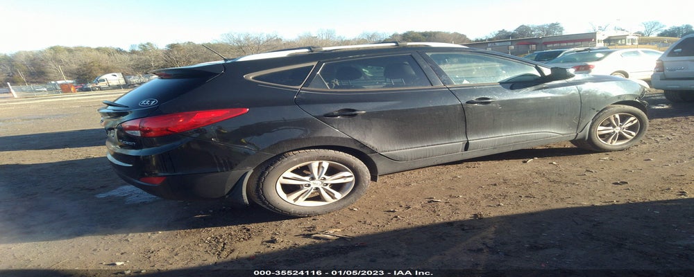 KM8JU3AC1CU433824 2012 HYUNDAI TUCSON photo no. 4