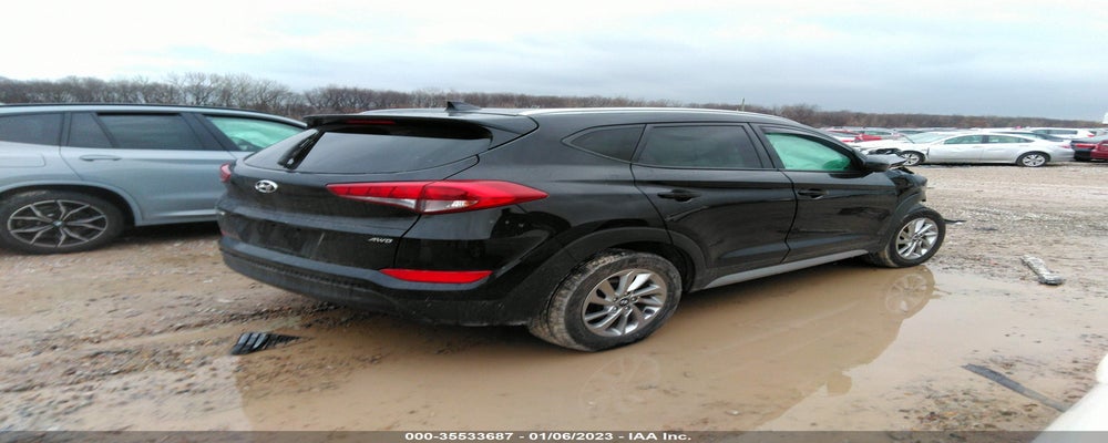 KM8J3CA4XJU669588 2018 HYUNDAI TUCSON photo no. 4