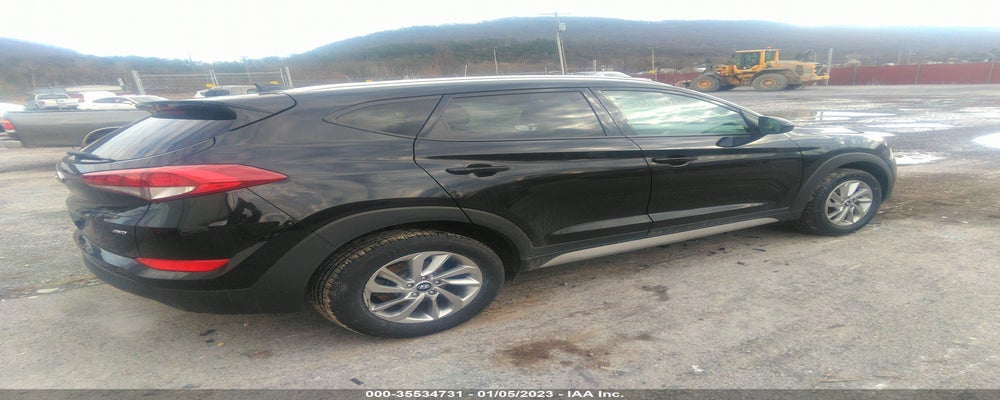 KM8J3CA46JU662833 2018 HYUNDAI TUCSON photo no. 4