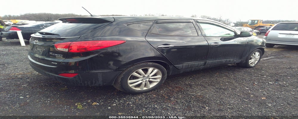 KM8JUCAC1BU227837 2011 HYUNDAI TUCSON photo no. 4