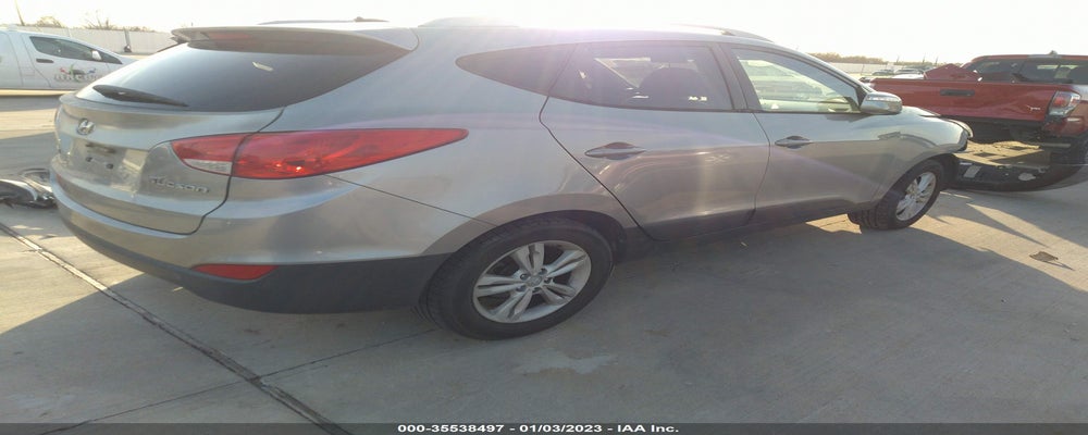 KM8JU3AC5CU484789 2012 HYUNDAI TUCSON photo no. 4