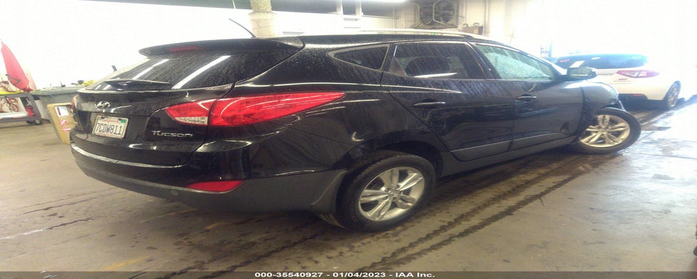 KM8JU3AC1DU769104 2013 HYUNDAI TUCSON photo no. 4