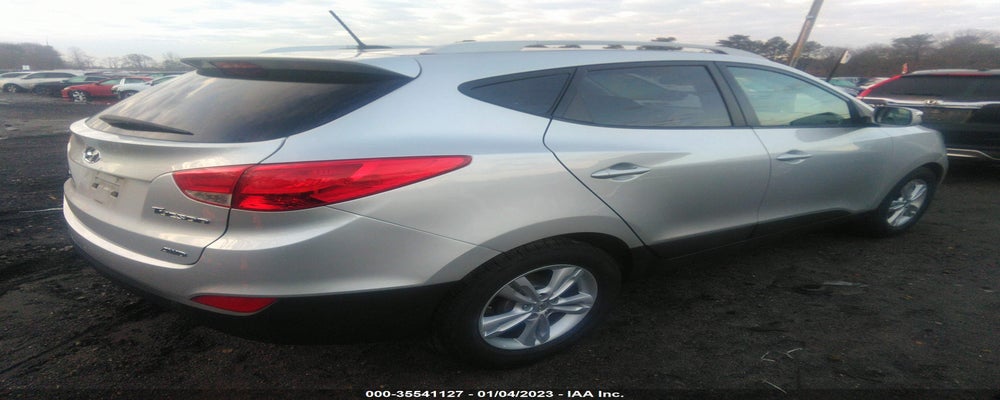 KM8JUCAC6CU491511 2012 HYUNDAI TUCSON photo no. 4