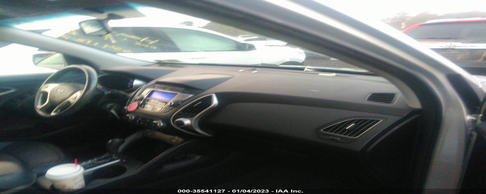 KM8JUCAC6CU491511 2012 HYUNDAI TUCSON photo no. 5