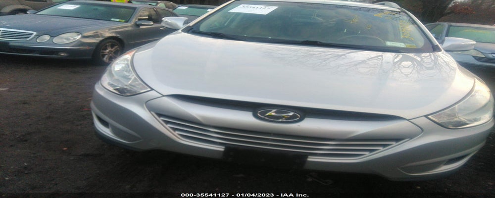 KM8JUCAC6CU491511 2012 HYUNDAI TUCSON photo no. 6