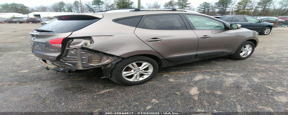KM8JUCAC5CU397149 2012 HYUNDAI TUCSON photo no. 4