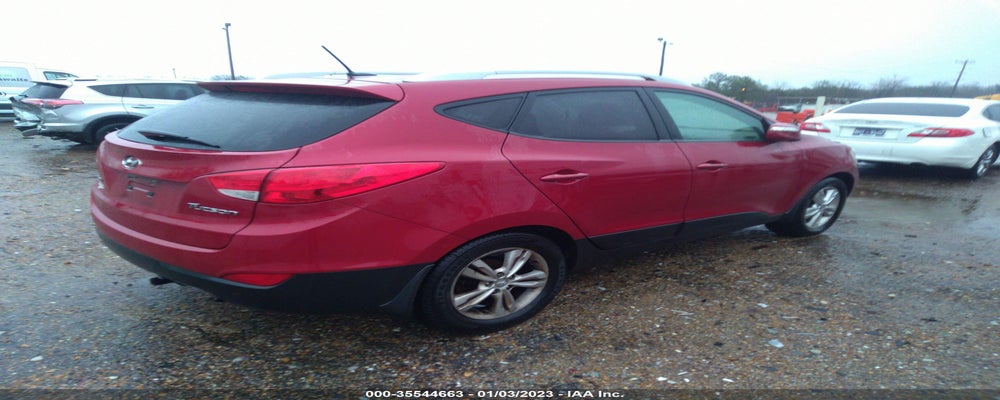 KM8JU3AC6CU433849 2012 HYUNDAI TUCSON photo no. 4