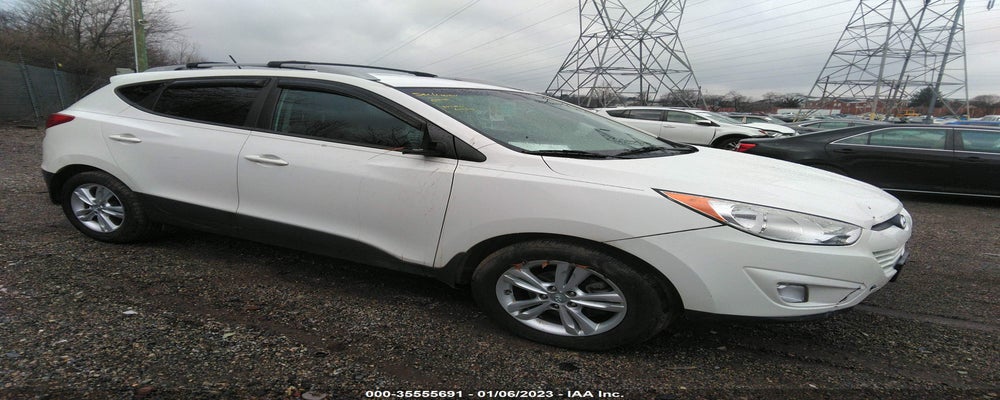 KM8JUCAC9DU667601 2013 HYUNDAI TUCSON photo no. 11