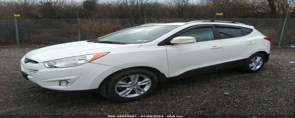 KM8JUCAC9DU667601 2013 HYUNDAI TUCSON photo no. 2