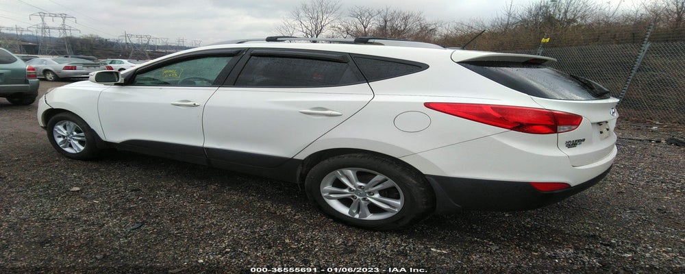 KM8JUCAC9DU667601 2013 HYUNDAI TUCSON photo no. 3