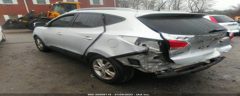 KM8JUCAC1CU395477 2012 HYUNDAI TUCSON photo no. 3