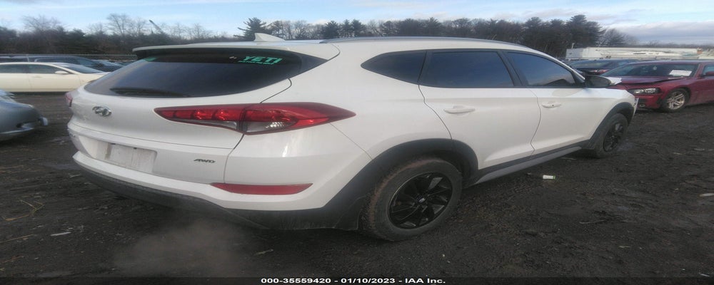 KM8J3CA42JU673781 2018 HYUNDAI TUCSON photo no. 4