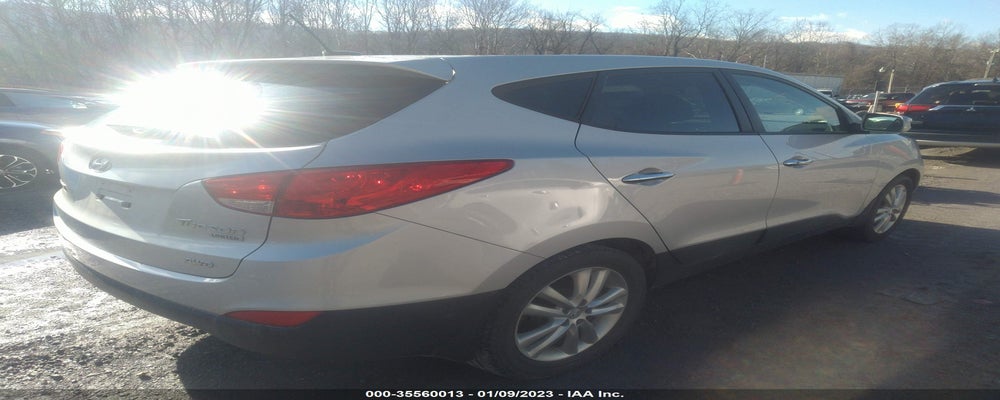 KM8JUCAC3DU775521 2013 HYUNDAI TUCSON photo no. 4