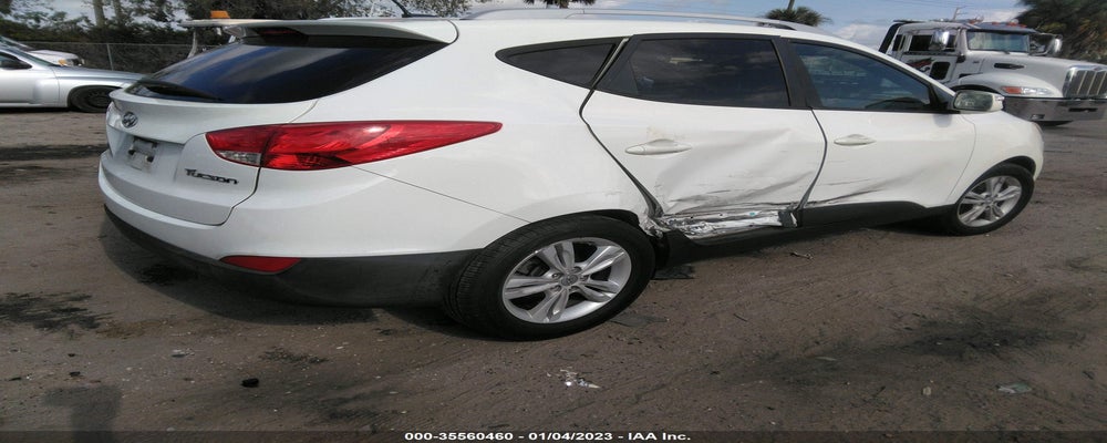 KM8JU3AC2CU499704 2012 HYUNDAI TUCSON photo no. 4