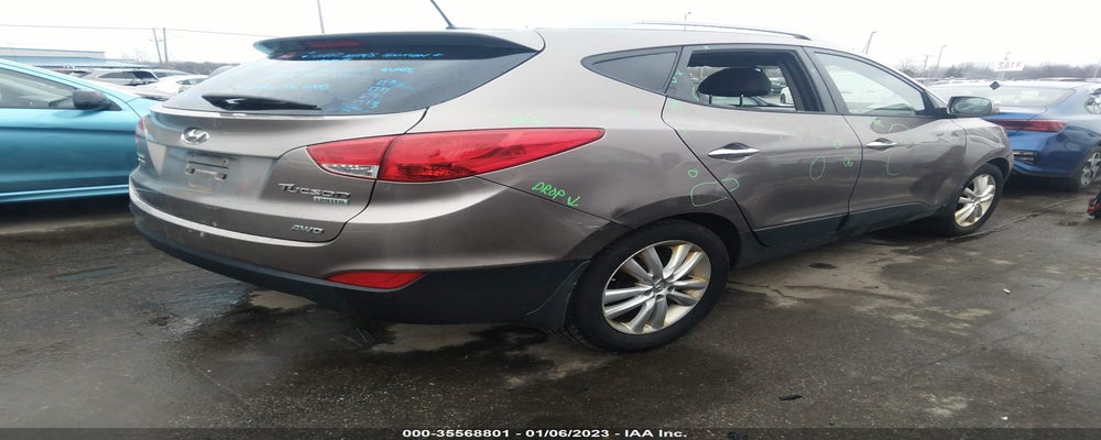 KM8JUCAC7BU171001 2011 HYUNDAI TUCSON photo no. 4