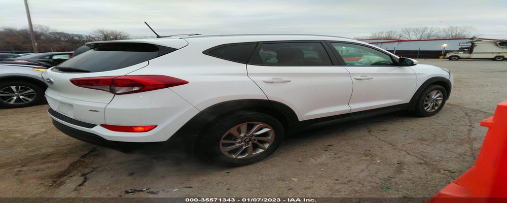 KM8J3CA4XGU250908 2016 HYUNDAI TUCSON photo no. 4