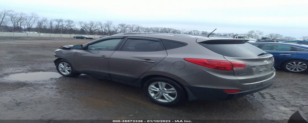 KM8JUCAC5DU724764 2013 HYUNDAI TUCSON photo no. 3