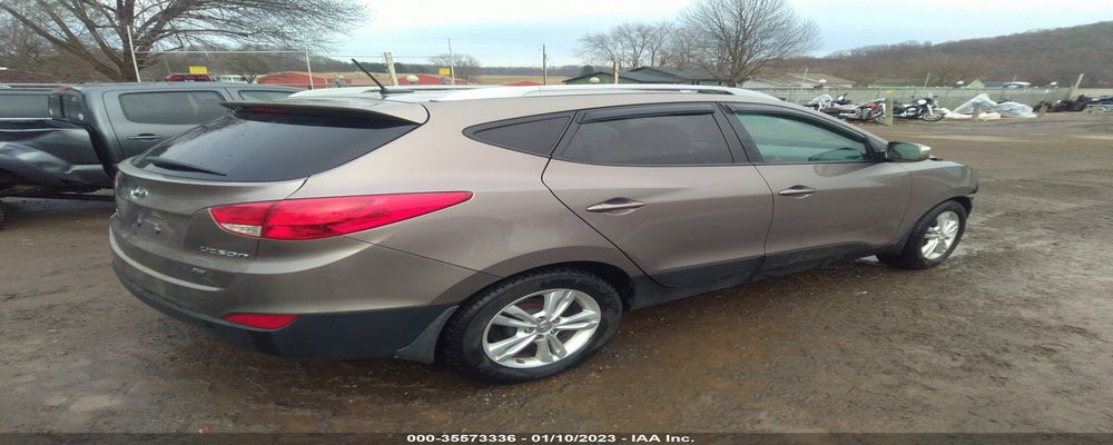 KM8JUCAC5DU724764 2013 HYUNDAI TUCSON photo no. 4