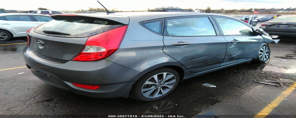 KMHCU5AE4FU211384 2015 HYUNDAI ACCENT photo no. 4