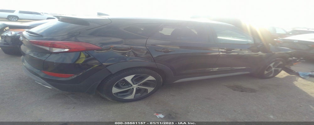 KM8J3CAL4JU699595 2018 HYUNDAI TUCSON photo no. 4