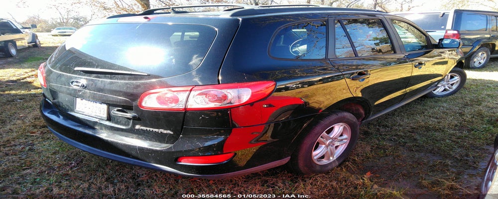 5NMSG3AB9AH394475 2010 HYUNDAI SANTA FE photo no. 4