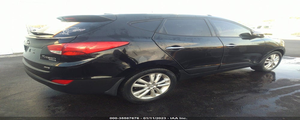 KM8JUCAC7BU170253 2011 HYUNDAI TUCSON photo no. 4