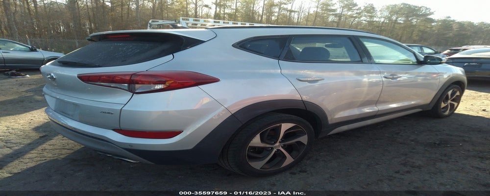 KM8J3CA28JU690003 2018 HYUNDAI TUCSON photo no. 4