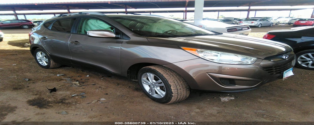 KM8JUCAC3CU430326 2012 HYUNDAI TUCSON photo no. 7