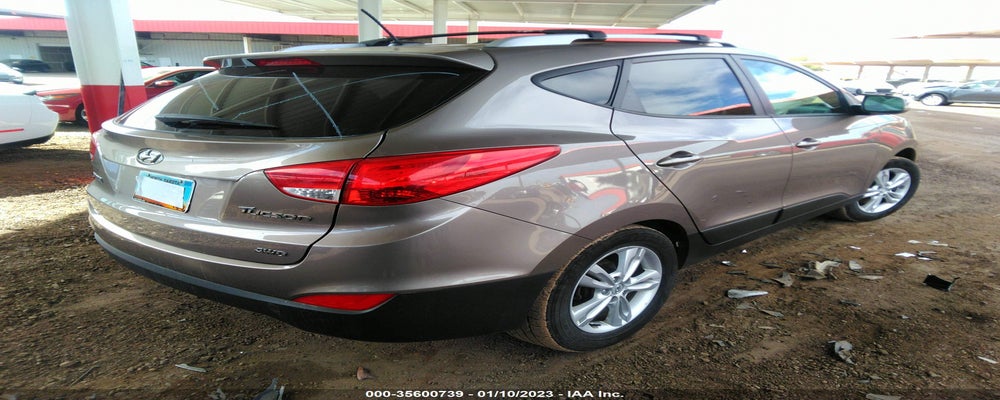 KM8JUCAC3CU430326 2012 HYUNDAI TUCSON photo no. 4